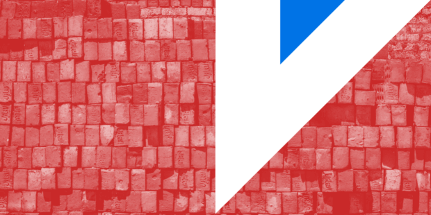 A wall – clearly still in progress of being constructed – comprised of many bricks